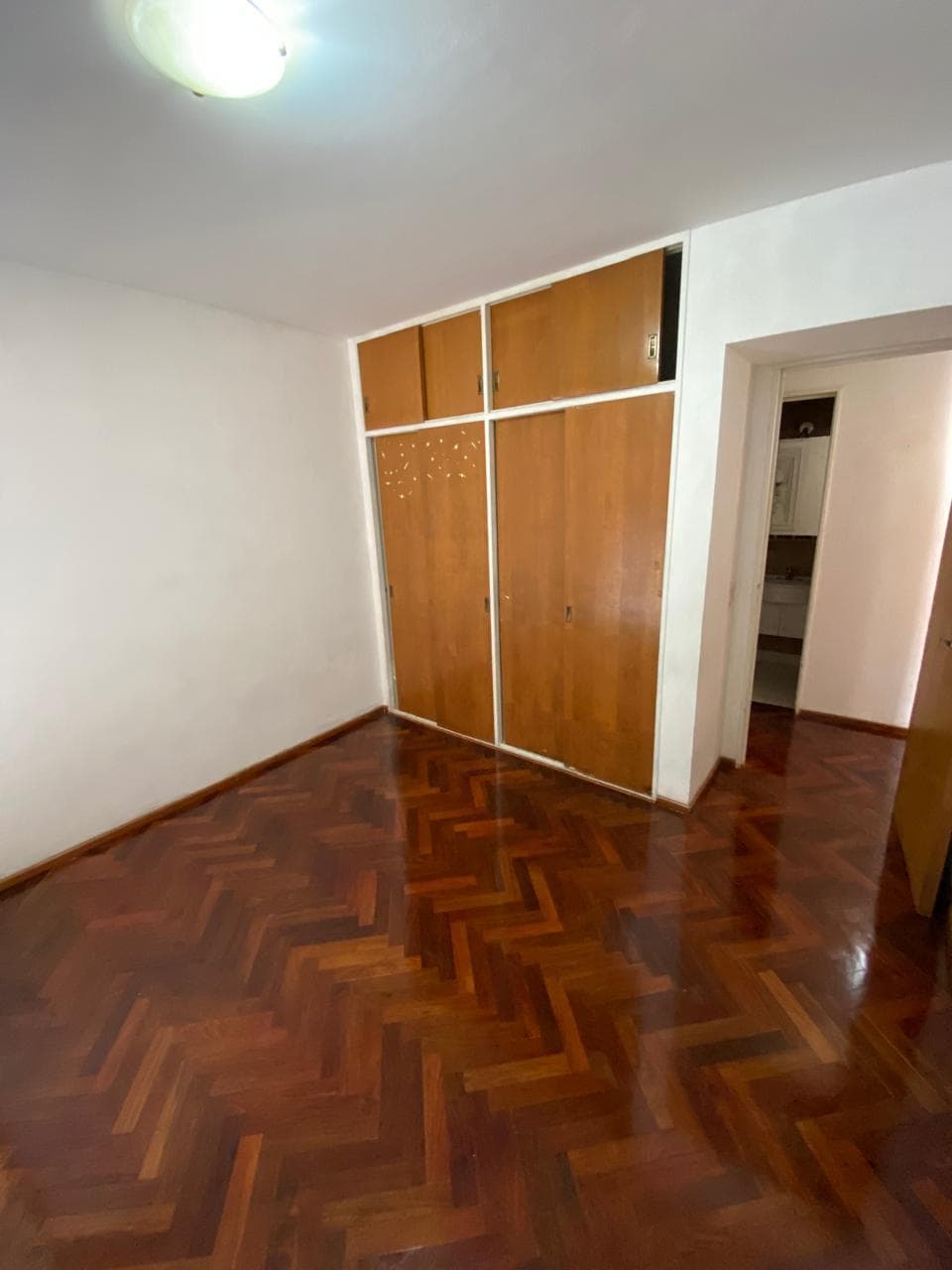 Dormitorio con placares