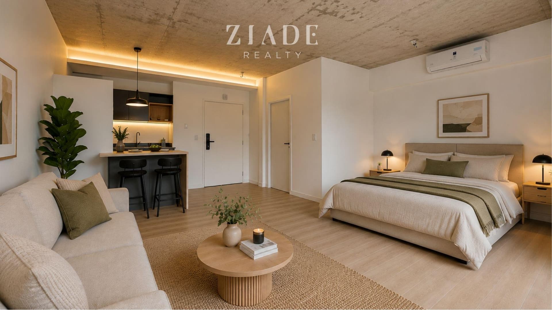 Living amoblado con cama matrimonial, sillón, mesa de centro y cocina integrada.