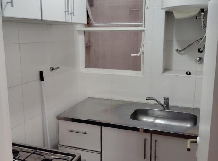Cocina a gas de 4 hornallas y termotanque